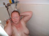 Redhead taking shower