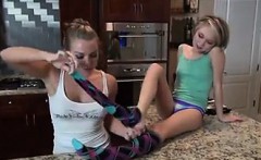 Lesbian Kisses And Licks Feet In The Kitchen