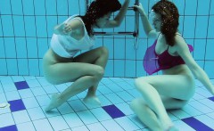 Hotly dressed teens in the pool