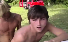 Two young twinks fuck outside at camp for boys