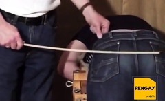 Caned over tight jeans Daddy boy