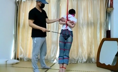 Girl in jeans tied up