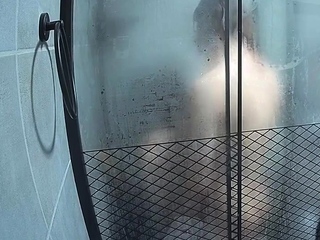 Sexy black amateur caught taking a shower on hidden cam