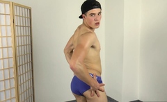 Handsome muscle boy shows his hard abs