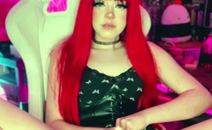 Beautiful redhead uses toy to masturbate