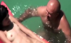 My nudist niece Emma floating in the sea (voyeur)